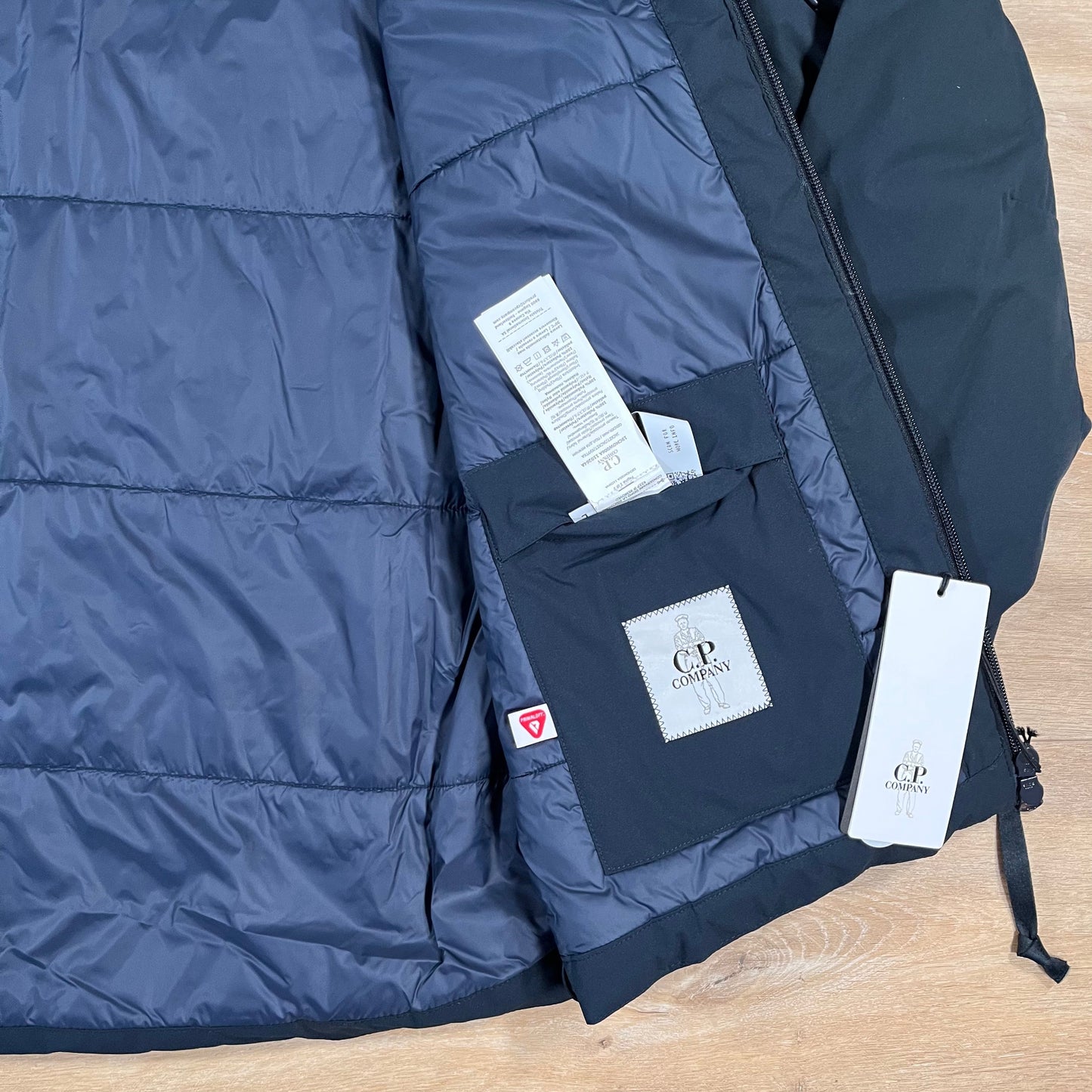 CP Company Pro-Tek Padded Lens Jacket in Navy