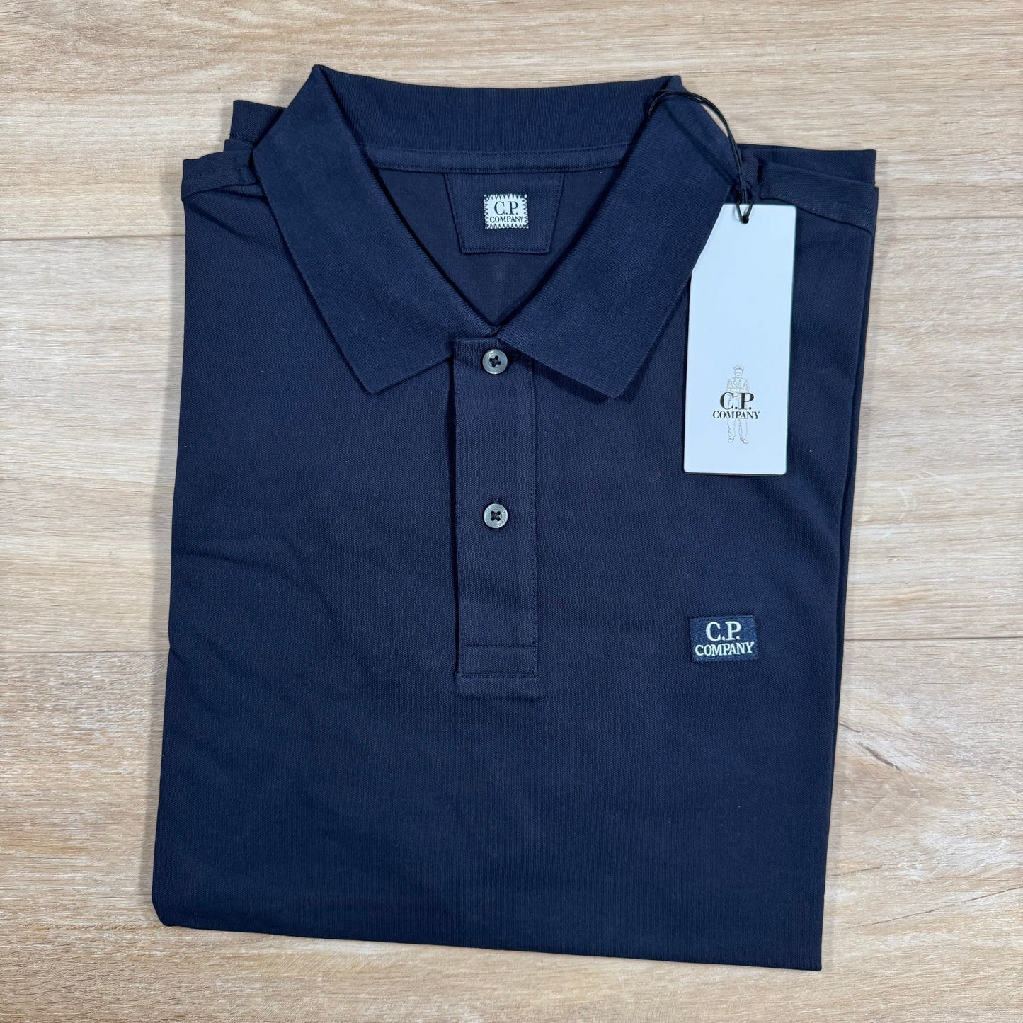 CP Company Stretch Piquet Logo Polo Shirt in Black Sand