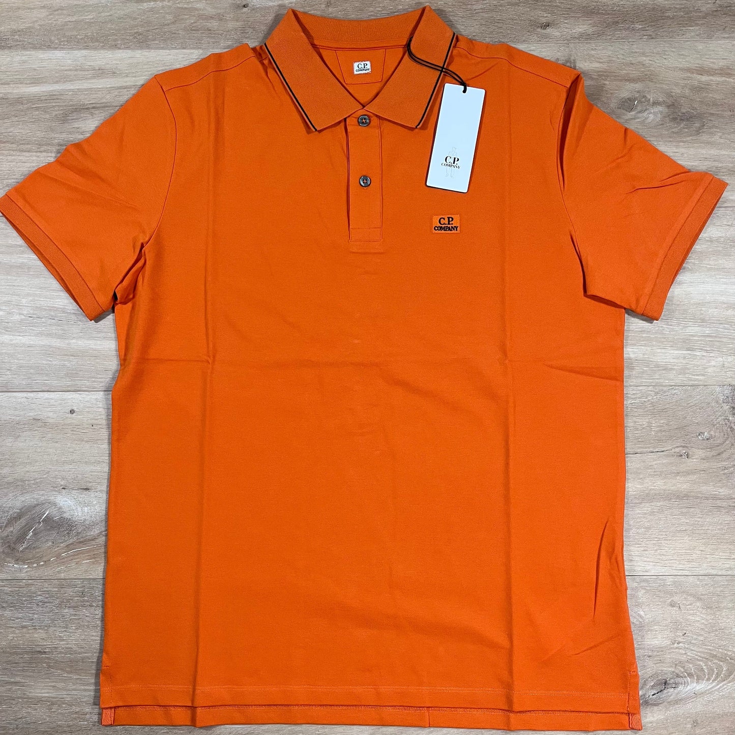 CP Company Stretch Piquet Striped Collar Polo Shirt in Russet Orange