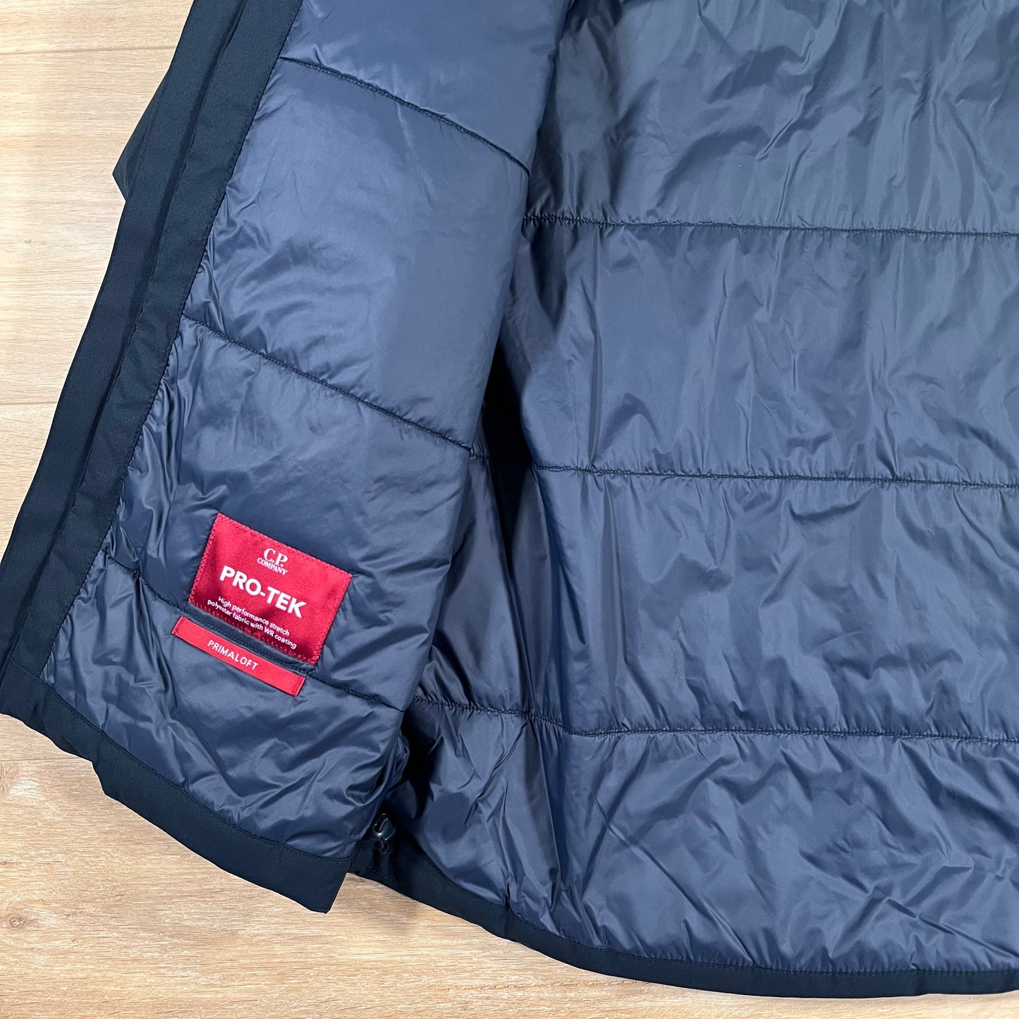 CP Company Pro-Tek Padded Lens Jacket in Navy